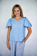BLUE LINEN FLUTTED SLEEVES WITH BOW AT BACK