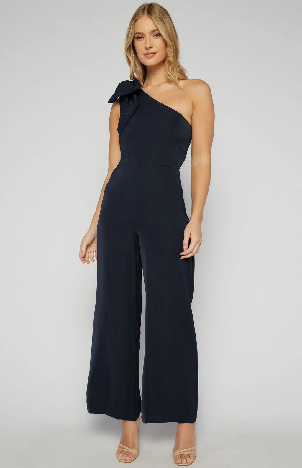 NAVY ONE SHOULDER JUMPSUIT WITH LARGE BOW