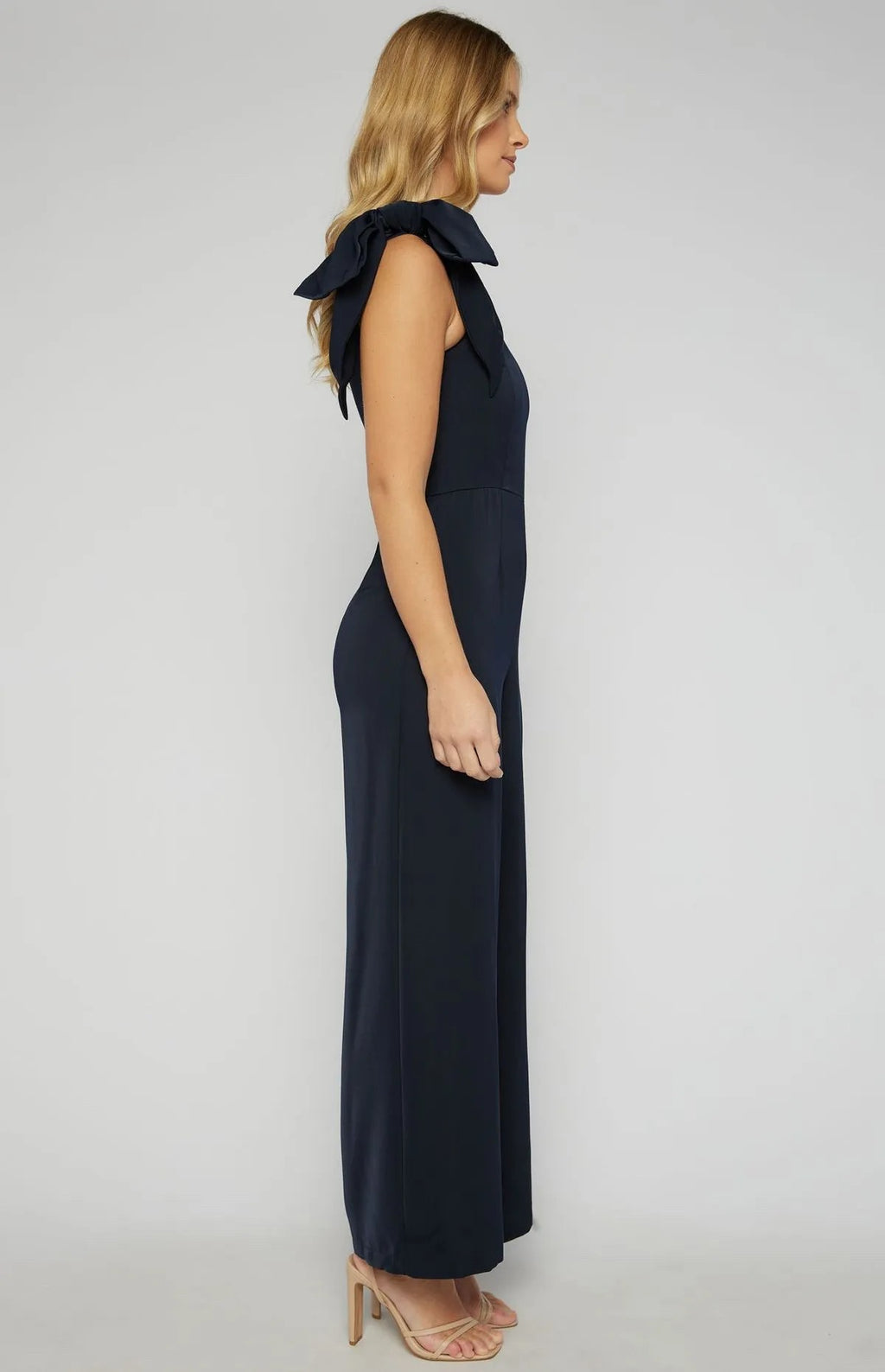 NAVY ONE SHOULDER JUMPSUIT WITH LARGE BOW